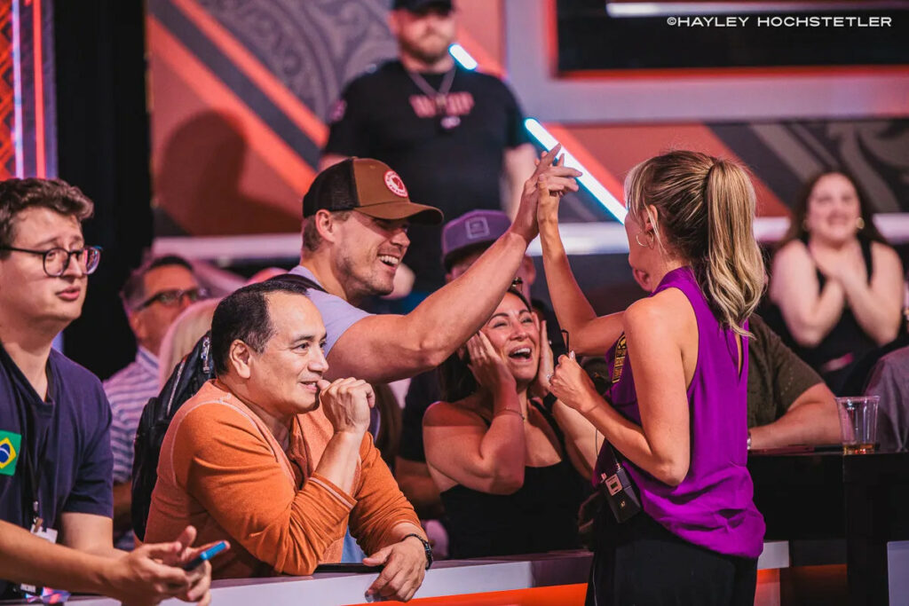 Kristen Foxen celebrates with her husband Alex on her rail during Day 7 of the Main Event